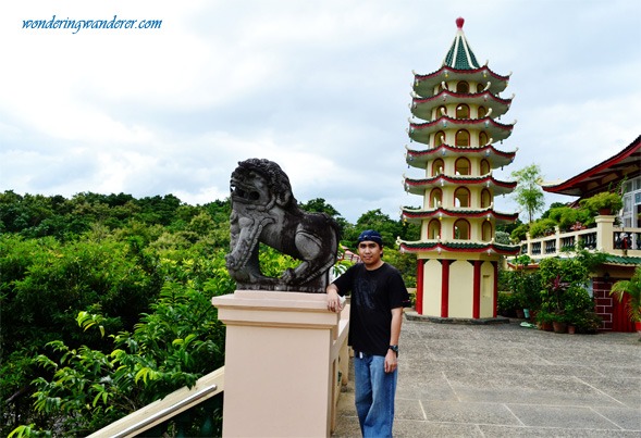 I'm posing beside the lion guardian in the Cebu Taoist Temple's terrace