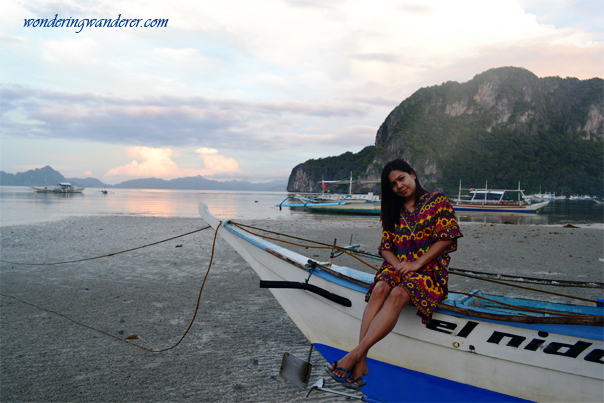 Sitting on top of the boat at Corong-Corong Beach